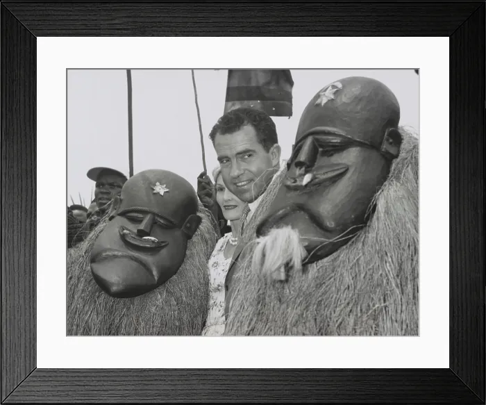 Framed Print : Vice President Richard Nixon standing among Liberian dancers. Underneath the traditional costumes and masks are Goa Devil Dancers. Pat Nixon is partially obscured. March 13, 1957 Framed Print : Vice President Richard Nixon standing among Liberian dancers. Underneath the traditional costumes and masks are Goa Devil Dancers. Pat Nixon is partially obscured. March 13, 1957