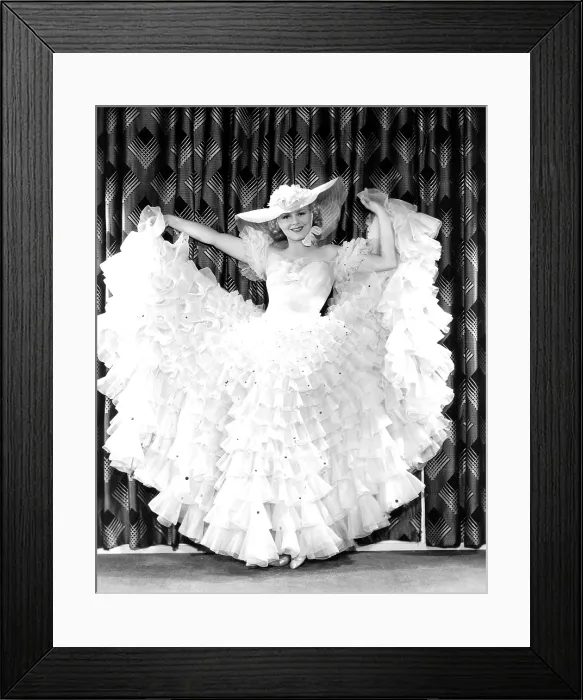 Framed Print : SONG AND DANCE MAN, Claire Trevor, in a coral chiffon frock dotted with silver sequins, 1936. TM & Copyright 20th Century Fox Film Corp. / courtesy Everett Collection Framed Print : SONG AND DANCE MAN, Claire Trevor, in a coral chiffon frock dotted with silver sequins, 1936. TM & Copyright 20th Century Fox Film Corp. / courtesy Everett Collection