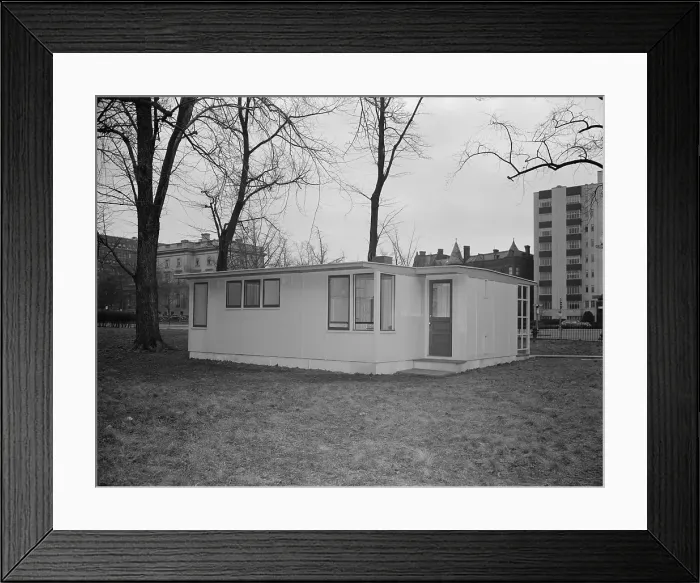 Framed Print : 30, 000 prefabricated house to be shipped to Great Britain under lend-lease in 1945. The house has a kitchen entrance (facing camera) and front entrance