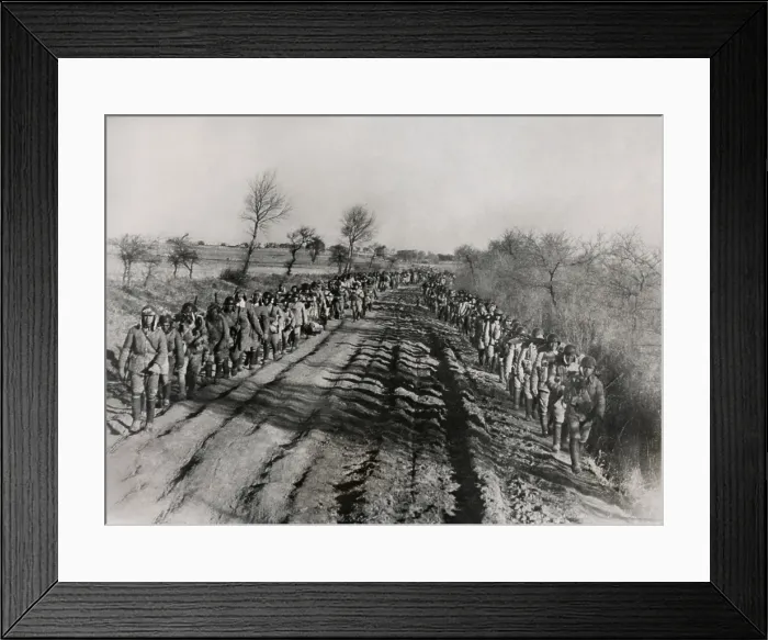 Framed Print : Chinese Civil War 1946-1949. Soldiers of the Chinese Nationalist Army march along a rutted road in Manchuria. Jan. 29, 1947. - (BSLOC_2014_15_168) Framed Print : Chinese Civil War 1946-1949. Soldiers of the Chinese Nationalist Army march along a rutted road in Manchuria. Jan. 29, 1947. - (BSLOC_2014_15_168)
