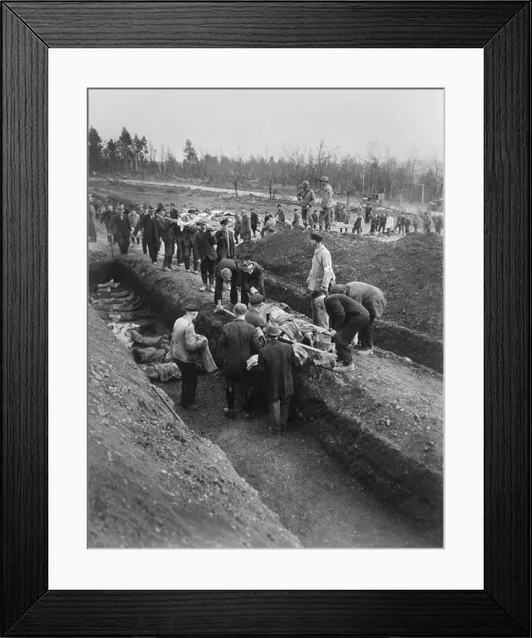 Framed Print : German civilians of Nordhausen were forced to dig graves for the victims of the concentration camp. April 1945, World War 2. (BSLOC_2014_4_25) Framed Print : German civilians of Nordhausen were forced to dig graves for the victims of the concentration camp. April 1945, World War 2. (BSLOC_2014_4_25)