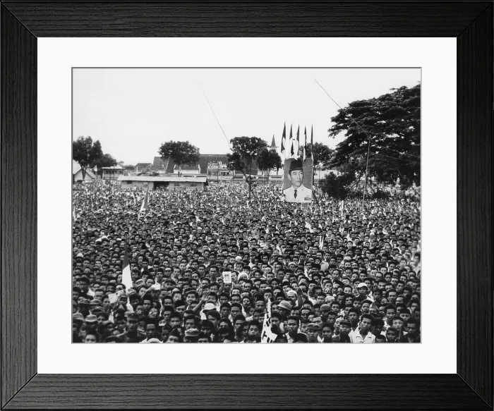 Framed Print : Massive demonstration in favor of President Sukarno in Makassar, Indonesia. After the first volatile decade of independence politics, Sukarno promoted Guided Democracy