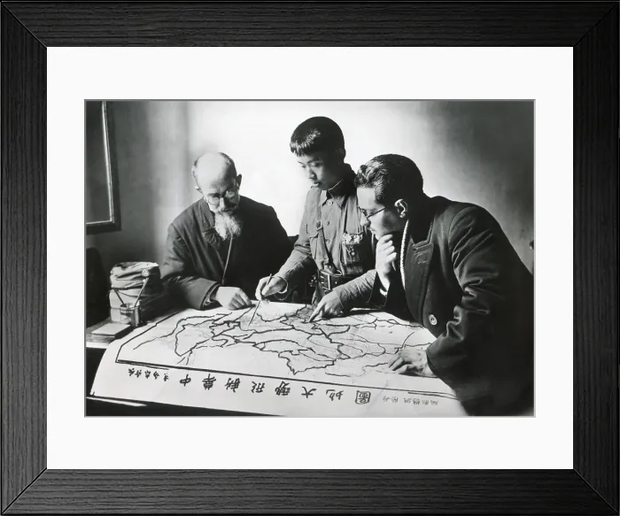Framed Print : Chinese army officer and two missionaries plot the advance of Communist forces