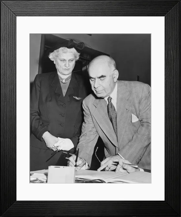 Framed Print : Herbert Lehman registering to vote with his wife. He was New York's Democratic governor from 1933 to 1942. He was in the U.S. Senate from 1950 to 1957 Framed Print : Herbert Lehman registering to vote with his wife. He was New York's Democratic governor from 1933 to 1942. He was in the U.S. Senate from 1950 to 1957