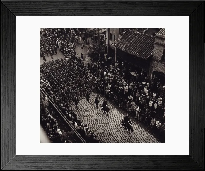 Framed Print : Overhead view of provincial troops marching along a city street in China. Photo taken in Kiangsu Province or Yunnan Province. By Arthur Rothstein, 1946. - (BSLOC_2014_15_166)
