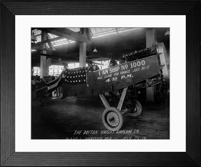 Framed Print : Completed plane at the Dayton-Wright Airplane Company. A sign reads, I am Ship No. 1000 and Will Leave for France July 31st, 4:30 PM. World War I. July 25, 1918