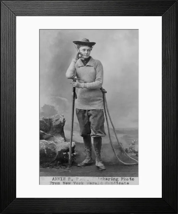 Framed Print : Miss Annie S. Peck, in her mountaineering gear, 1911. She wears a tunic sweater over trousers tucked into gaiters over climbing boots Framed Print : Miss Annie S. Peck, in her mountaineering gear, 1911. She wears a tunic sweater over trousers tucked into gaiters over climbing boots