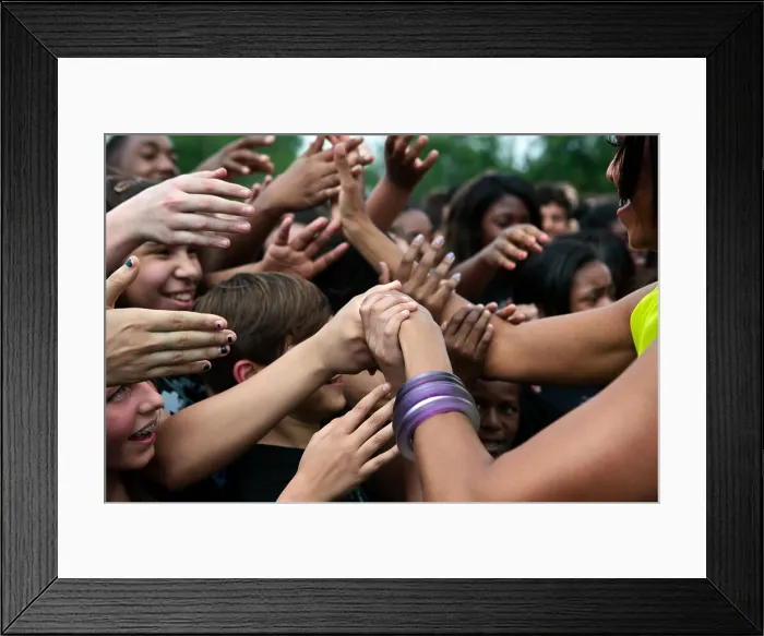 Framed Print : First Lady Michelle Obama greets students at Alice Deal Middle School in Washington, D.C. May 3, 2011. (BSLOC_2015_13_145)