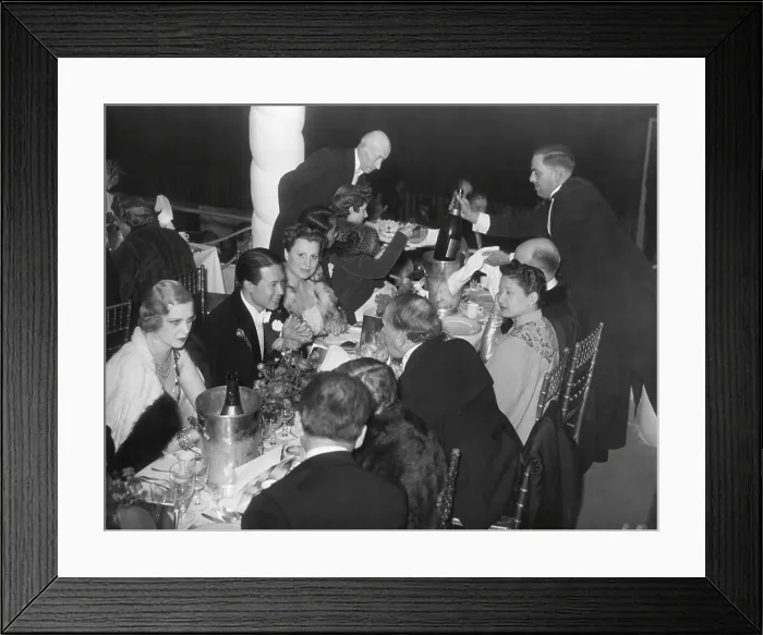 Framed Print : Bao Dai and his wife, Nam Phuong, dine with fashionable friends at Nuit de Longchamp in Paris. Ca. 1935-38