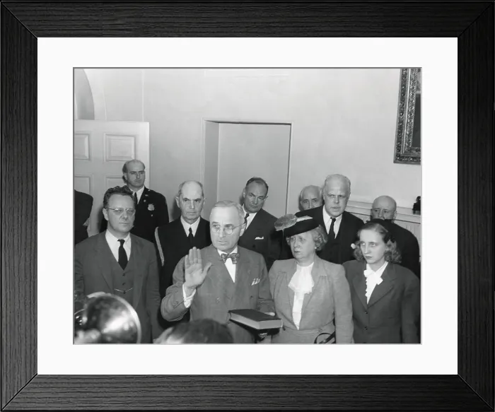 Framed Print : Vice-President Harry Truman is taking the oath of office, at 7:09 p.m. on April 12, 1945. Bess and Margaret Truman are standing to the new President's right