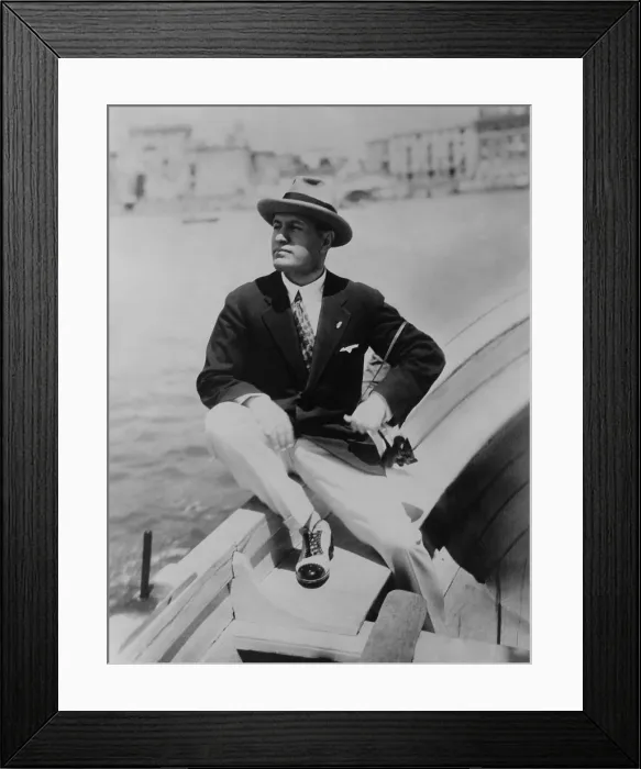 Framed Print : Benito Mussolini seated on boat, facing left, wearing summer suit. Ca.1915-1925. - (BSLOC_2015_1_40)