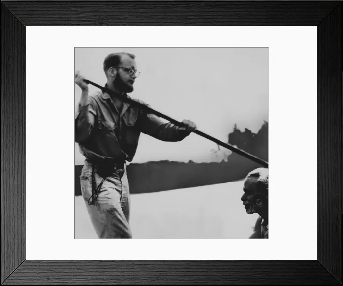 Framed Print : Michael Rockefeller, in a canoe with a native during his anthropological exploration in Dutch New Guinea. On Nov
