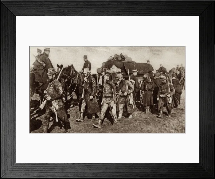Framed Print : World War 1. Belgian troops, weary and mud-covered from fighting in the trenches moving forward to take up a new position near Veurne. 1914
