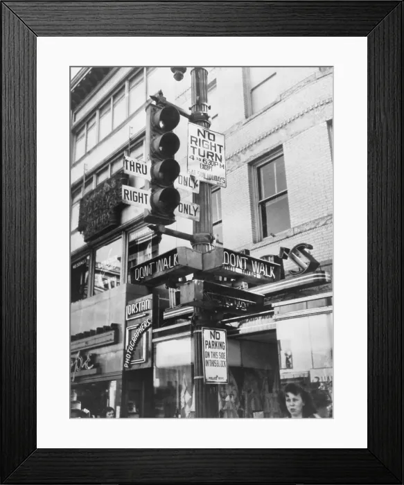 Framed Print : A complicated traffic signal to uncomplicate traffic in Washington, D.C. The Walk and Don't Walk signals help pedestrians safely cross the streets. 1949 Framed Print : A complicated traffic signal to uncomplicate traffic in Washington, D.C. The Walk and Don't Walk signals help pedestrians safely cross the streets. 1949
