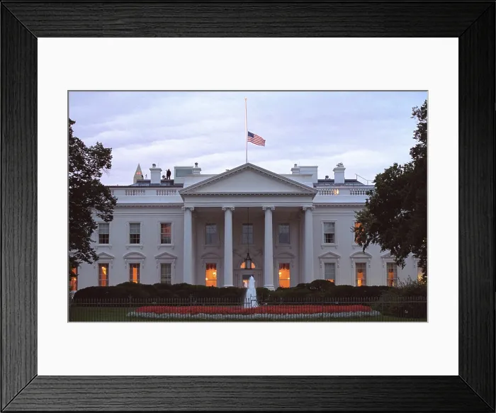 Framed Print : American flag flies at half-staff over the White House at sunrise Friday, Sept. 14, 2001