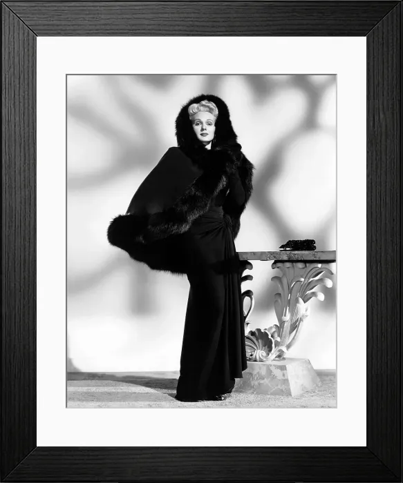 Framed Print : THE CORPSE CAME C.O.D. Adele Jergens, in a dress and cape by Jean Louis, 1947