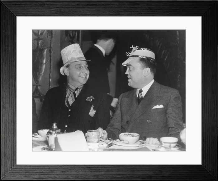 Framed Print : J. Edgar Hoover and Julius Lulley enjoying a festive breakfast at Washington's Mayflower Hotel. Ca. 1935