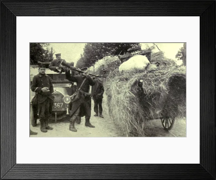 Framed Print : World War 1. German invasion troops searching for Belgian guerrilla fighters in Aarschot. Germans executed 156 civilians in Aarschot in 1914