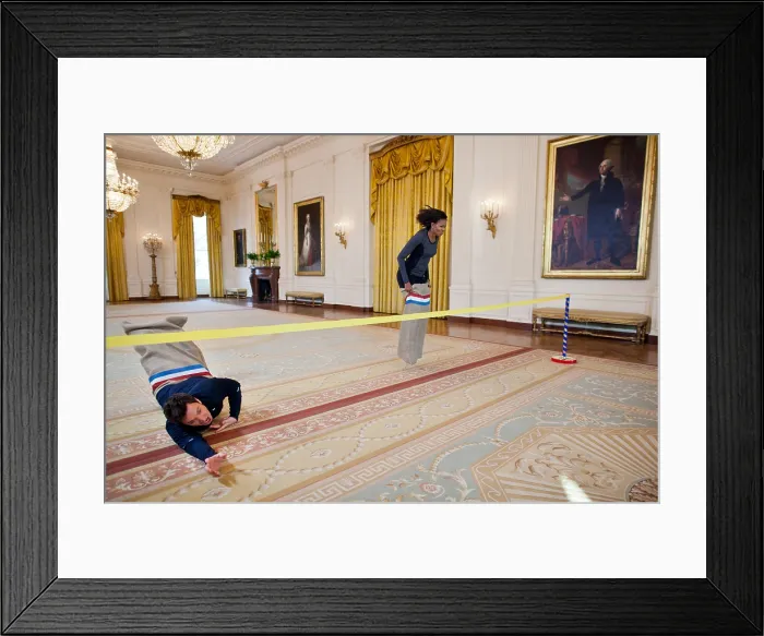 Framed Print : Jimmy Fallon and First Lady Michelle Obama have a potato sack race in the East Room. They were taping for Late Night with Jimmy Fallon on Jan Framed Print : Jimmy Fallon and First Lady Michelle Obama have a potato sack race in the East Room. They were taping for Late Night with Jimmy Fallon on Jan