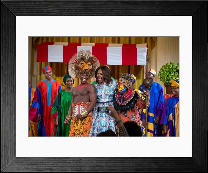Framed Print : First Lady Michelle Obama joins the cast of Disney's THE LION KING East Room of the White House. They performed for Kids State Dinner, July 18, 2014. (BSLOC_2015_13_190)
