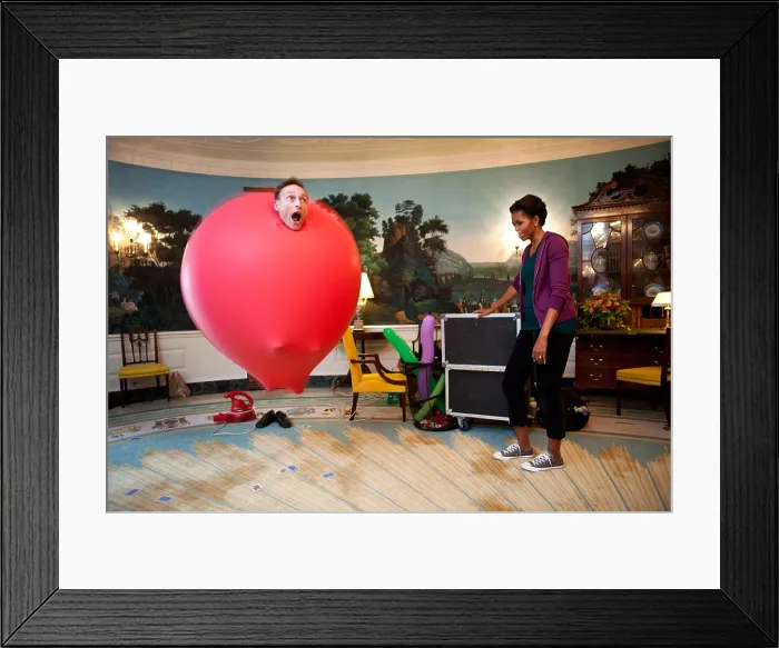 Framed Print : John Cassidy in a six-foot red balloon in the Diplomatic Reception Room with Michelle Obama. White House, Oct. 11, 2011. (BSLOC_2015_13_187) Framed Print : John Cassidy in a six-foot red balloon in the Diplomatic Reception Room with Michelle Obama. White House, Oct. 11, 2011. (BSLOC_2015_13_187)