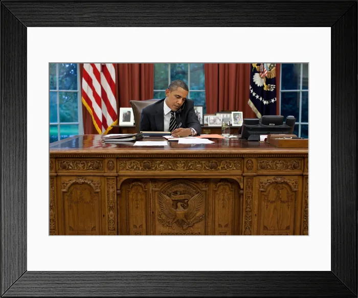 Framed Print : President Barack Obama at his Oval Office desk, Sept. 7, 2011. Obama is talking with Gov. Rick Perry about the unprecedented fires in Texas. (BSLOC_2015_3_2) Framed Print : President Barack Obama at his Oval Office desk, Sept. 7, 2011. Obama is talking with Gov. Rick Perry about the unprecedented fires in Texas. (BSLOC_2015_3_2)