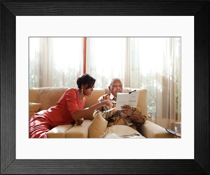 Framed Print : First Lady Michelle Obama meets with former President Nelson Mandela of South Africa. At Mandela's home in Houghton, South Africa, June 21, 2011
