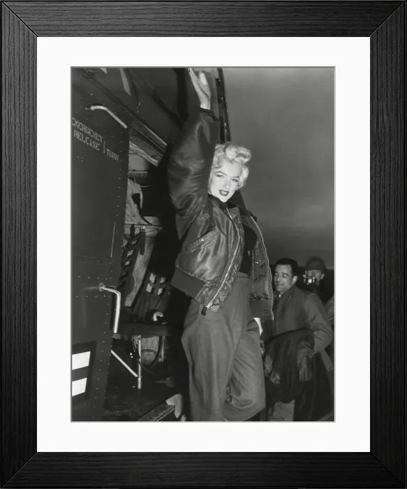 Framed Print : Marilyn Monroe arriving by helicopter at a U.S. military base in Korea. She performed ten shows in four days for U.S. Troops in Korea. Ca. Feb. 18-22, 1954. (BSLOC_2014_13_207)