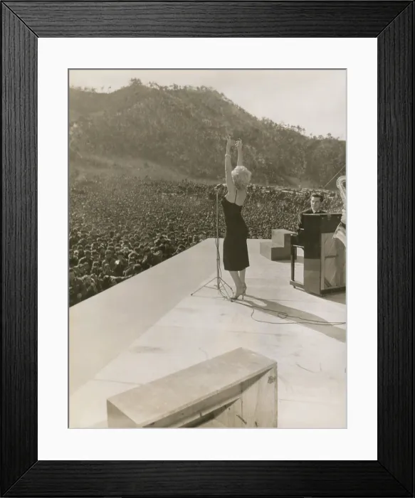 Framed Print : Monroe in Korea performing. She performed ten shows in four days during her USO tour in Korea. Ca. Feb. 18-22, 1954. (BSLOC_2014_13_210)