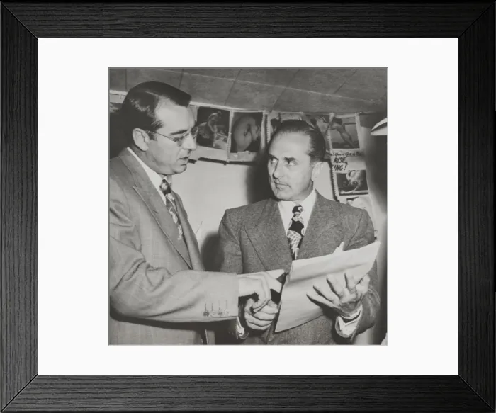 Framed Print : Gangster Johnny Rosselli (right) checks a writ of habeas corpus with his lawyer, Frank Desimone. On July 28, 1948 Rosselli surrendered to the U.S