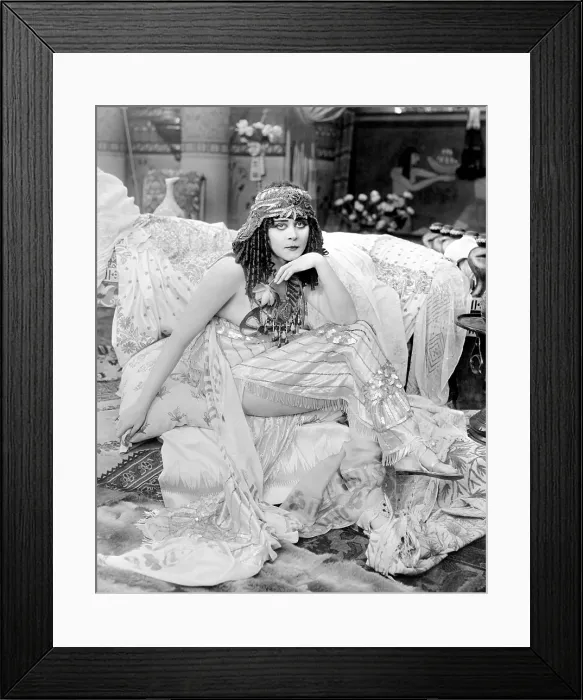 Framed Print : CLEOPATRA, Theda Bara, in a costume by George James Hopkins, 1917, Fox Film Corporation, TM & Copyright / courtesy Everett Collection Framed Print : CLEOPATRA, Theda Bara, in a costume by George James Hopkins, 1917, Fox Film Corporation, TM & Copyright / courtesy Everett Collection