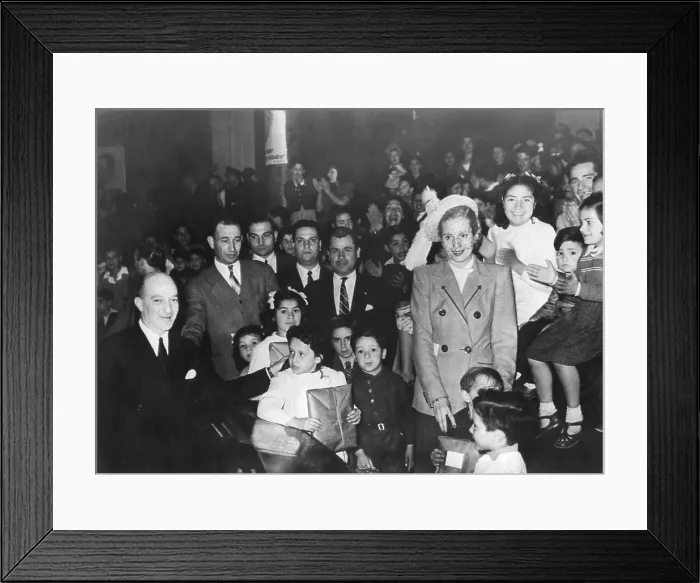 Framed Print : First Lady Eva Peron, distributing gifts to children at the Eva Peron Foundation