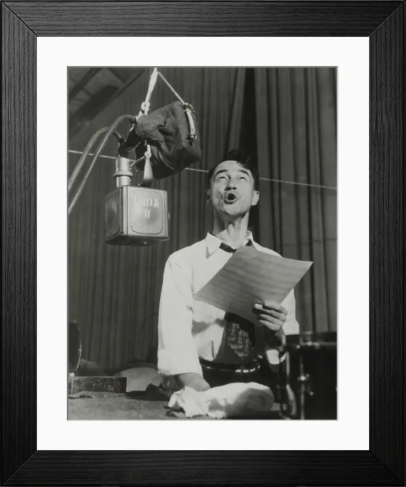 Framed Print : Pinto Colvig in Walt Disney studios creating sounds for an animated film in the 1930s