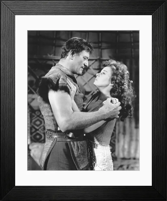 Framed Print : THE CONQUEROR, from left, John Wayne, Susan Hayward, 1956 Framed Print : THE CONQUEROR, from left, John Wayne, Susan Hayward, 1956