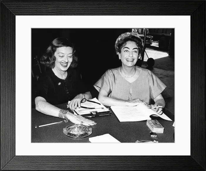 Framed Print : WHAT EVER HAPPENED TO BABY JANE?, from left, Bette Davis, Joan Crawford, at a script reading, 1962