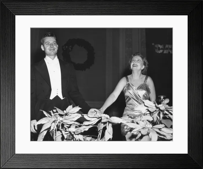 Framed Print : Margaret Truman acknowledges the audience applause at Carnegie Hall. With her is Robert Shaw, leader of the male chorus of the radio broadcast. Dec. 20, 1949 Framed Print : Margaret Truman acknowledges the audience applause at Carnegie Hall. With her is Robert Shaw, leader of the male chorus of the radio broadcast. Dec. 20, 1949