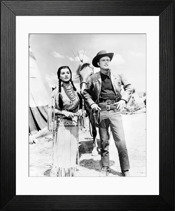 Framed Print : WHITE FEATHER, from left, Debra Paget, Robert Wagner, 1955, TM and copyright 20th Century Fox Film Corp. All rights reserved / Courtesy Everett Collection