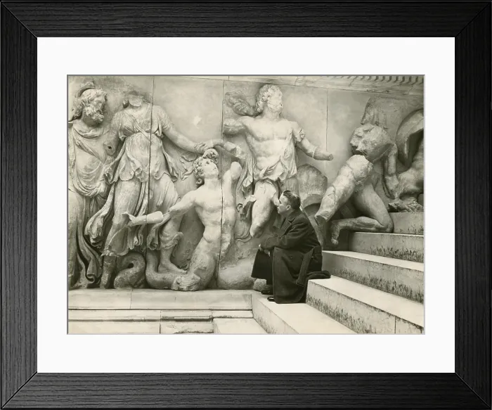 Framed Print : Charlie Chaplin on the steps of the Greek Alter at the Pergamon Museum in Berlin. March 13, 1931. - (BSLOC_2014_14_6) Framed Print : Charlie Chaplin on the steps of the Greek Alter at the Pergamon Museum in Berlin. March 13, 1931. - (BSLOC_2014_14_6)