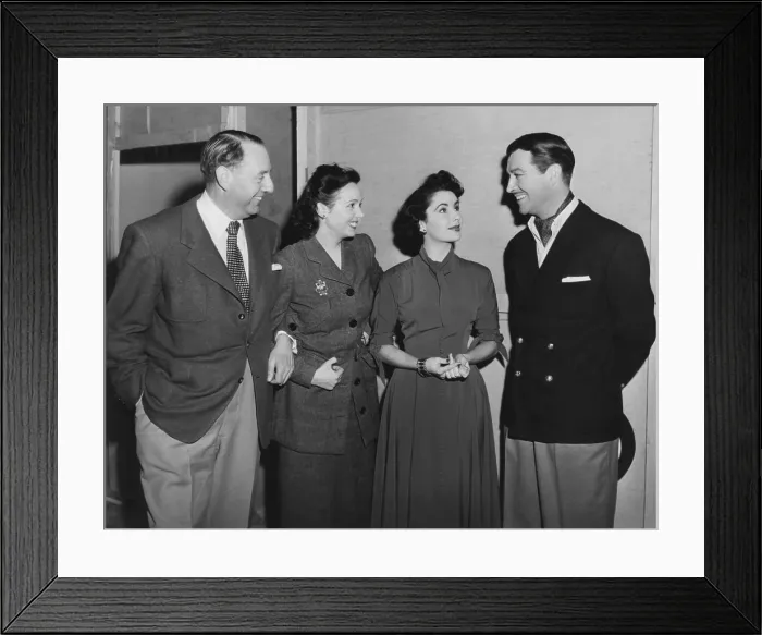 Framed Print : CONSPIRATOR, from left: director Victor Saville arm in arm with visitor Jessie Matthews, Elizabeth Taylor, Robert Taylor on set, 1949 Framed Print : CONSPIRATOR, from left: director Victor Saville arm in arm with visitor Jessie Matthews, Elizabeth Taylor, Robert Taylor on set, 1949