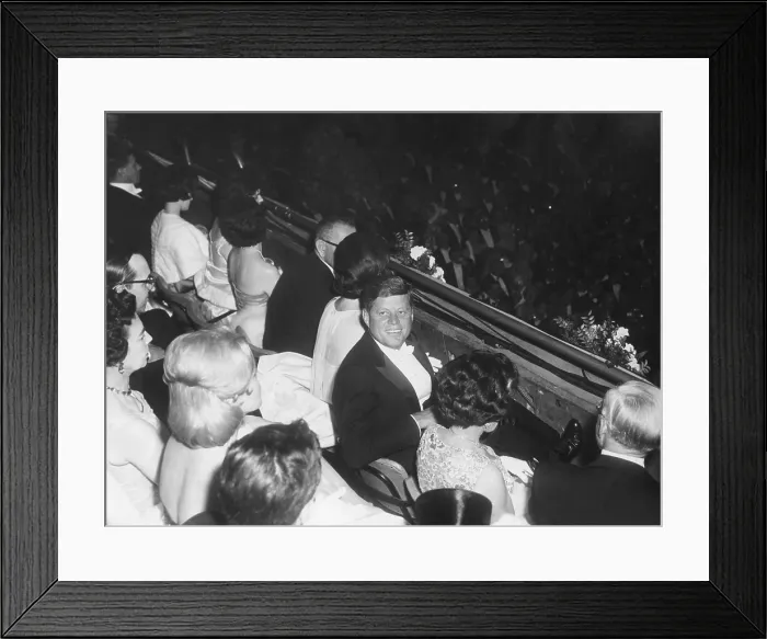 Framed Print : President John F. Kennedy looks up from his seat in the balcony at the inaugural ball. Jan. 20, 1961 Framed Print : President John F. Kennedy looks up from his seat in the balcony at the inaugural ball. Jan. 20, 1961