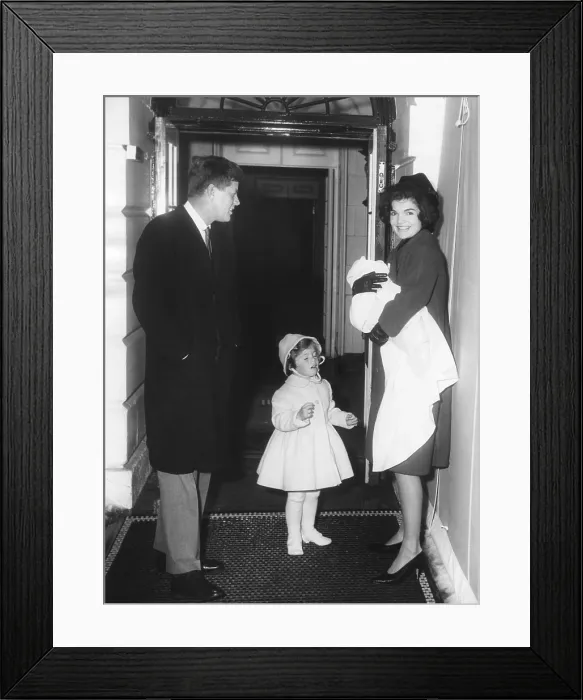 Framed Print : Kennedy Family Returns from Palm Beach, Florida on Feb. 4, 1961. President John Kennedy; Caroline Kennedy; Jacqueline Kennedy holding John Kennedy, Jr Framed Print : Kennedy Family Returns from Palm Beach, Florida on Feb. 4, 1961. President John Kennedy; Caroline Kennedy; Jacqueline Kennedy holding John Kennedy, Jr