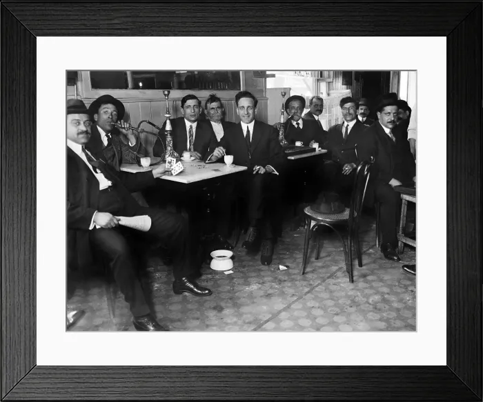 Framed Print : Lebanese-Syrian immigrant men in suits smoking hookahs in a restaurant in the New York City neighborhood, possibly Bay Ridge, Brooklyn