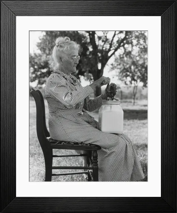 Framed Print : Elderly farm woman using a small glass butter churn. Oklahoma, July 1935. (BSLOC_2013_8_82)