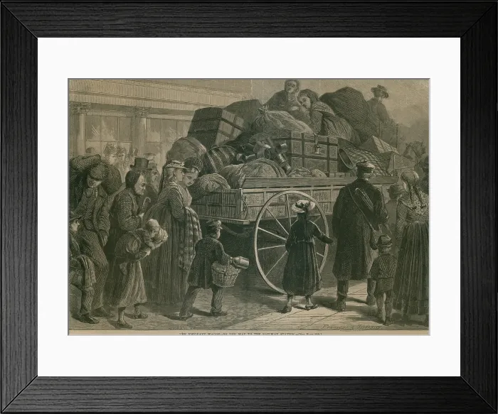 Framed Print : An Immigrant Wagon packed with baggage, is followed by a procession of immigrants heading for the train station and destinations in the US interior. 1870's