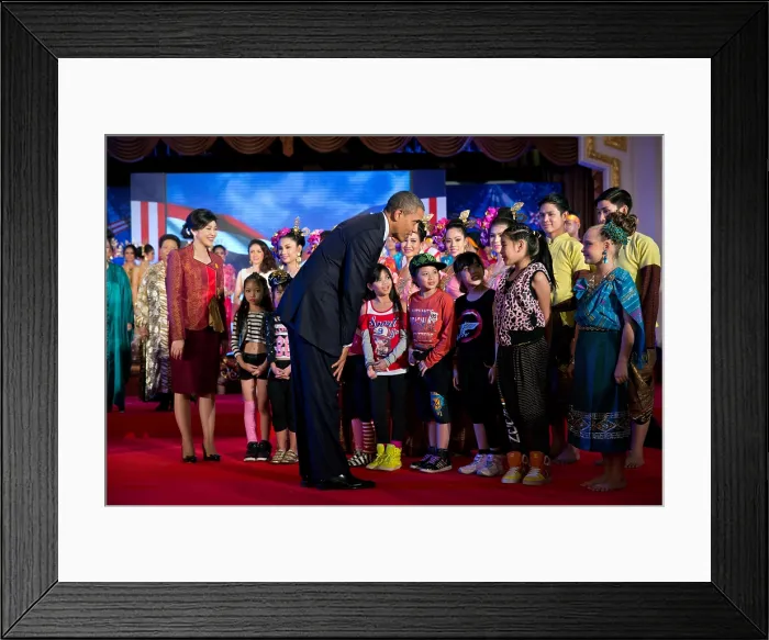 Framed Print : President Barack Obama and Thai Prime Minister Yingluck Shinawatra greets young performers. Government House in Bangkok, Thailand, Nov. 18, 2012. (BSLOC_2015_3_208)