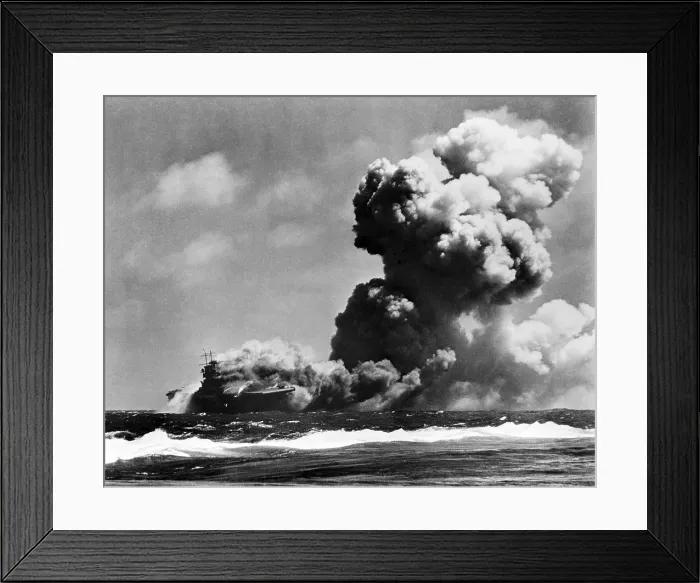 Framed Print : The USS Wasp burning after she was struck by three torpedoes from a Japanese submarine. South West Pacific, east of the Solomon Islands, where she sank on Sept. 15, 1942