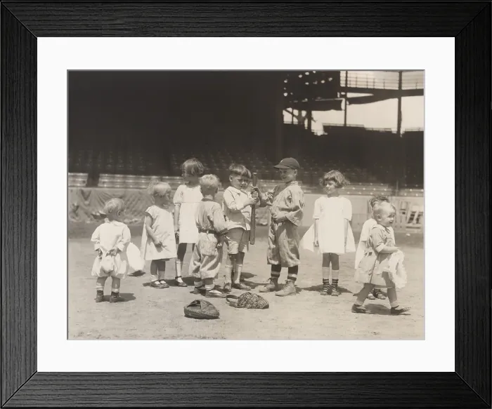 Framed Print : Little Kids on a baseball field trying to get the upper hand on the bat, to decide who bats first
