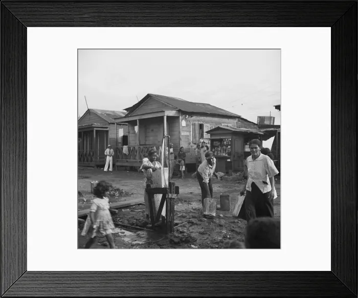 Framed Print : One pump is the community water supply in the workers quarter of Porta de Tierra, part of San Juan, Puerto Rico. January 1938 photo by Edwin Rosskam