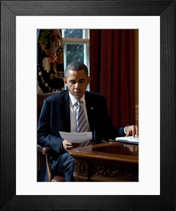 Framed Print : President Barack Obama reads a document in the Oval Office, Feb. 21, 2012. (BSLOC_2015_3_3) Framed Print : President Barack Obama reads a document in the Oval Office, Feb. 21, 2012. (BSLOC_2015_3_3)