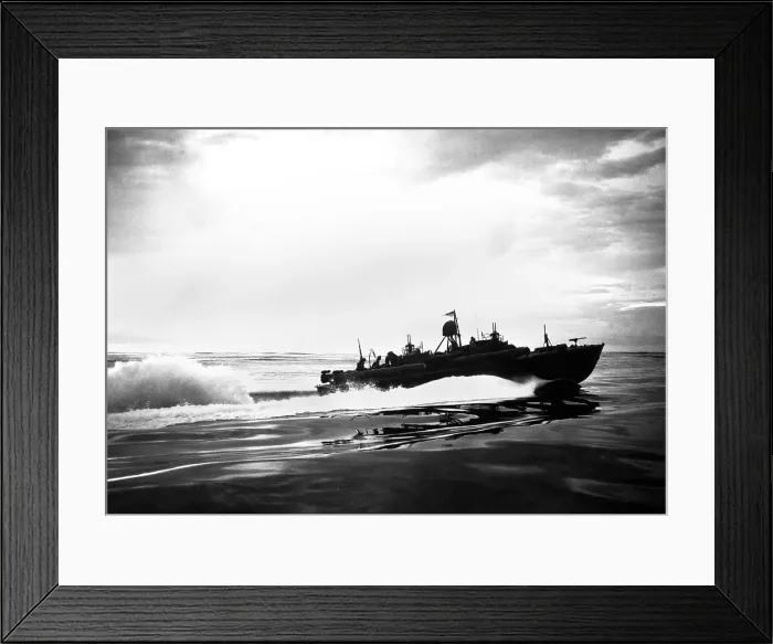 Framed Print : PT boat off coast of New Guinea during World War 2. Patrol Torpedo boats were fast small craft that attacked larger ships. 1943. (BSLOC_2013-12_177)